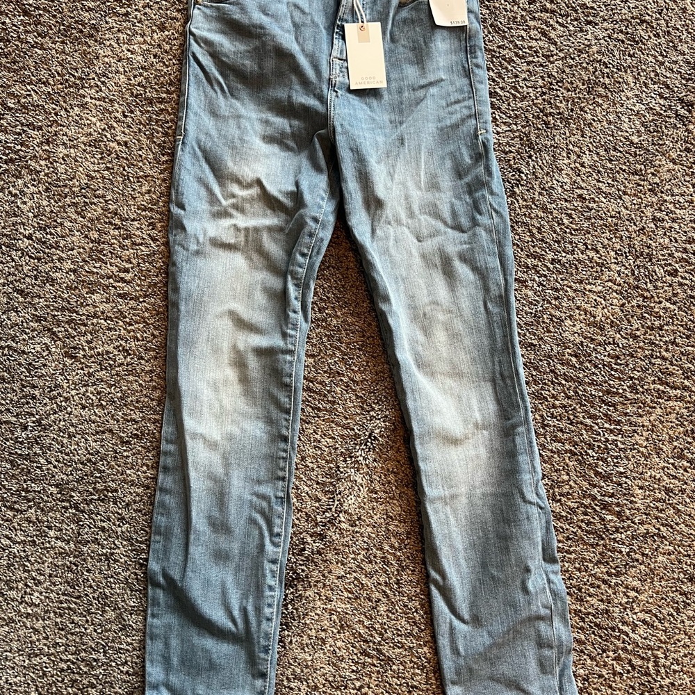 Good American Light Blue Skinny Jeans with Distressed Look